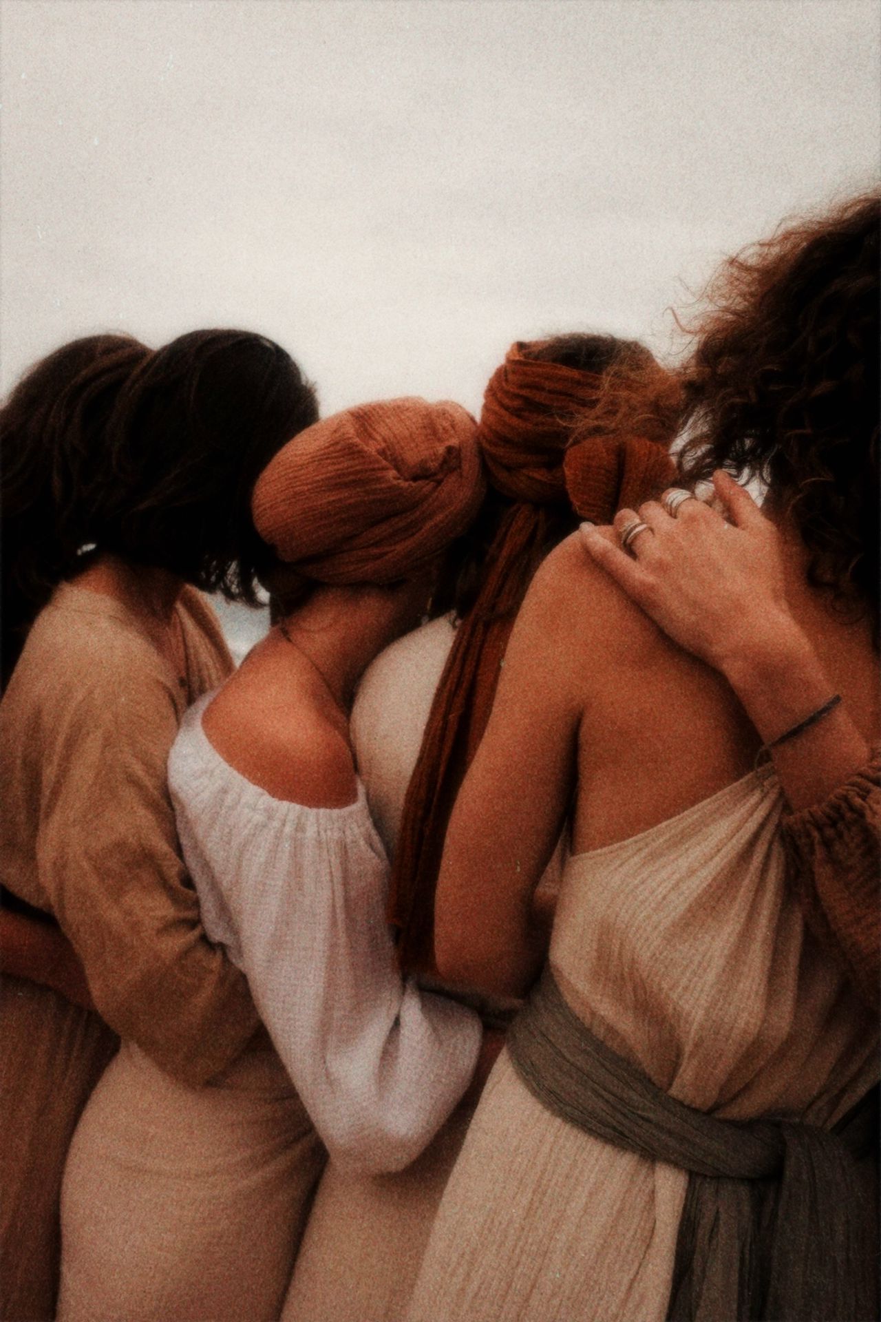 Women sitting in circle, reflecting