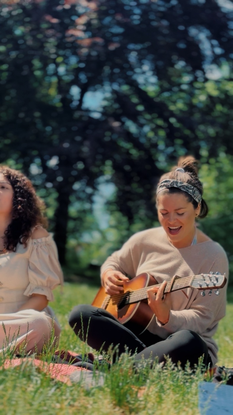 Women singing together at the circle, June 2026