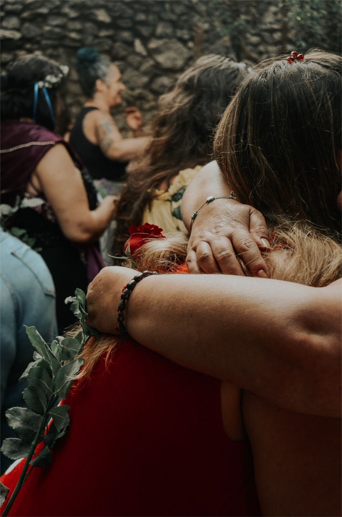 Women embracing in circle